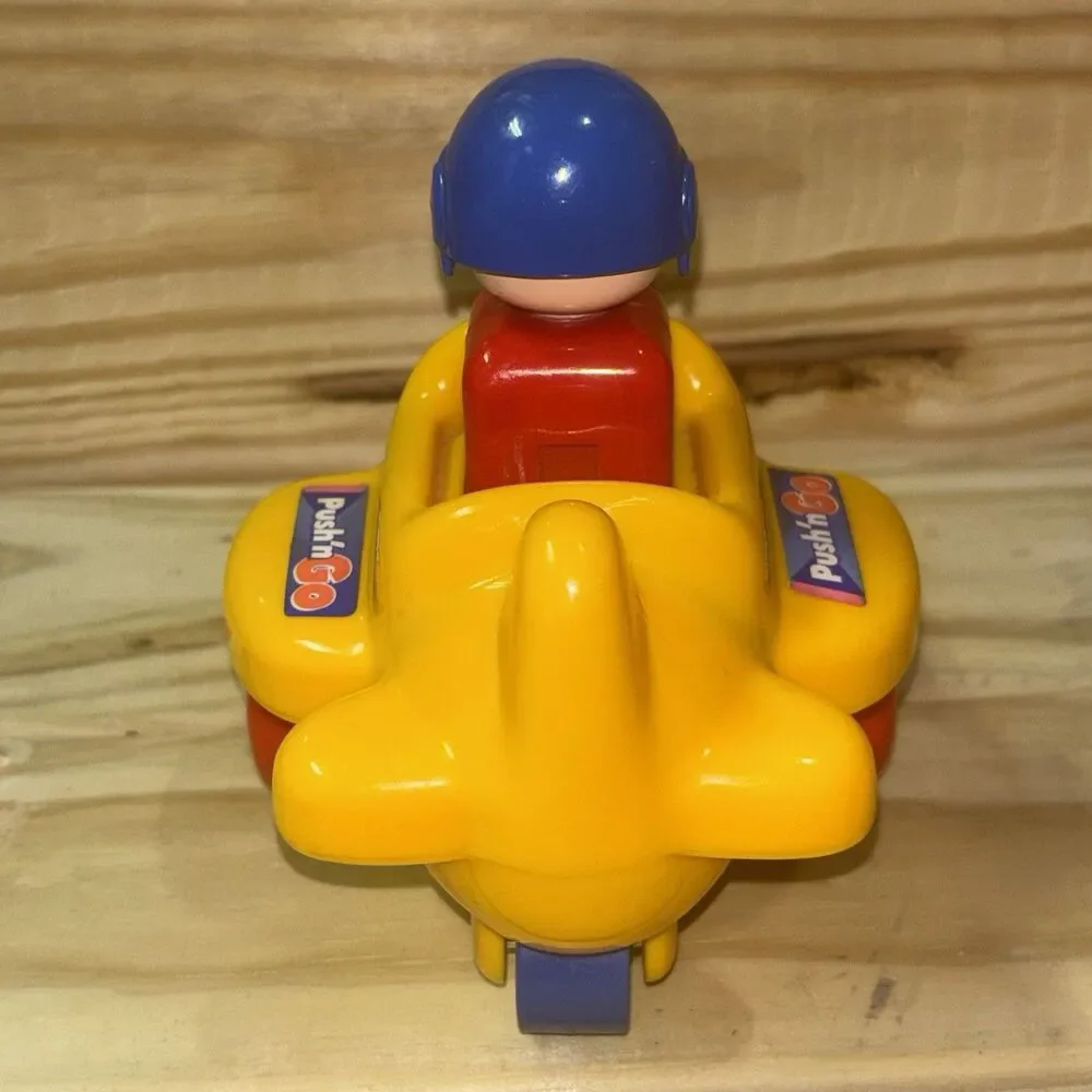 Vintage 1991 Tomy Push N Go Airplane Toy Baby Einstein Moving Pilot Yellow Works